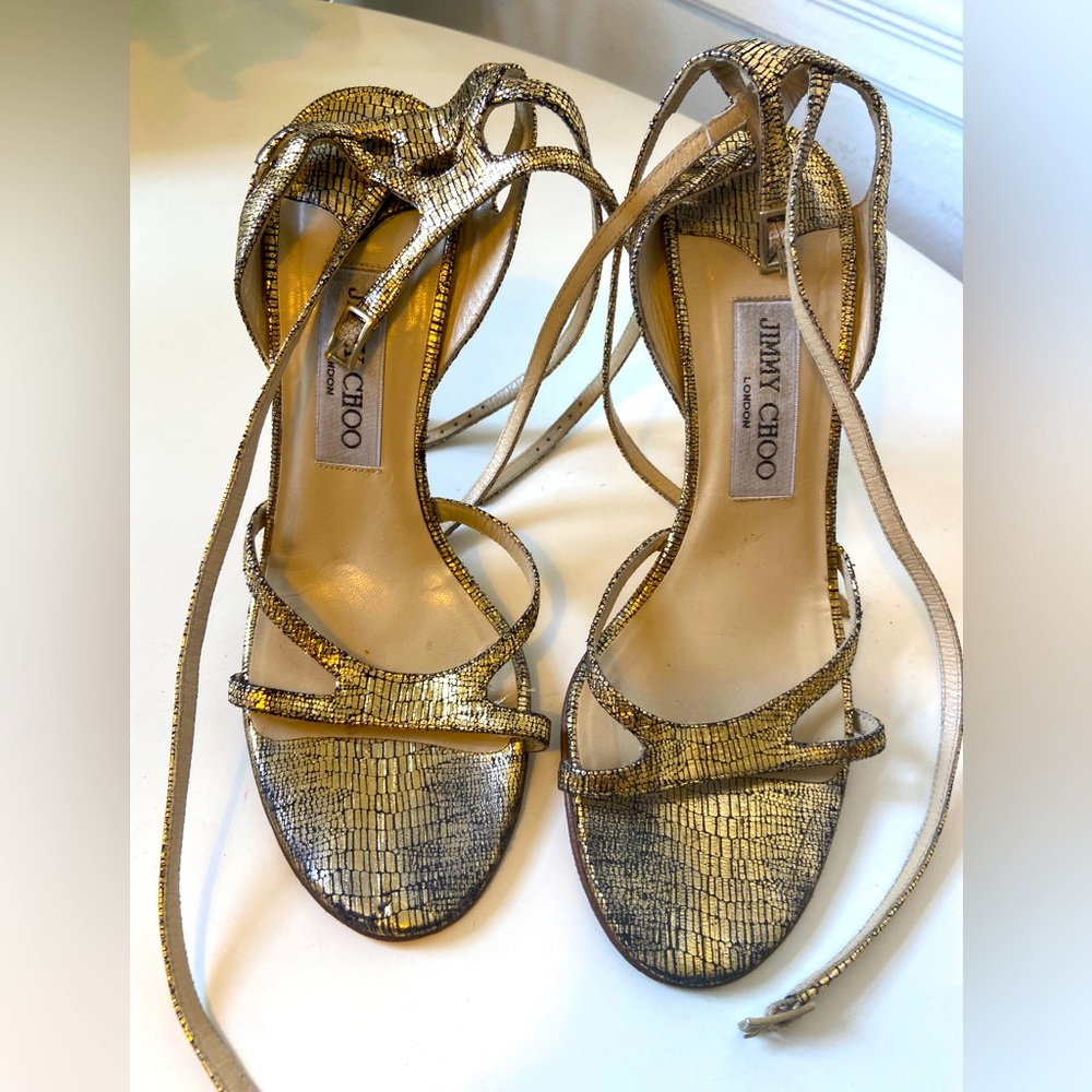 Jimmy Choo black and gold heels size 37.5 heel is 3 inch